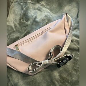 Blush color Fanny pack or crossbody bag.
